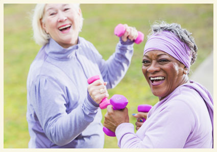 Happy seniors top-notch Wellness Center during exercise