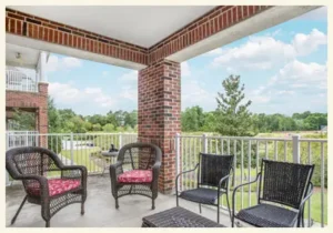 View of a large Balcony with sitting arngements